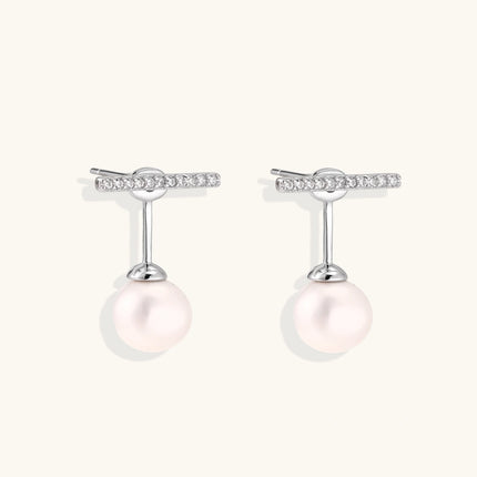 Rhodium-plated sterling silver ear jacket earrings with diamond-set horizontal bar and freshwater pearl drop
