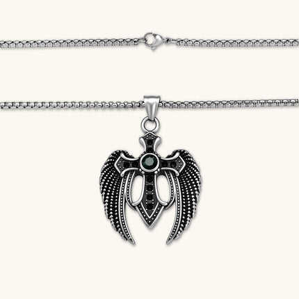 Silver stainless steel angel wing cross pendant necklace with green CZ center stone and black crystals on a box chain.