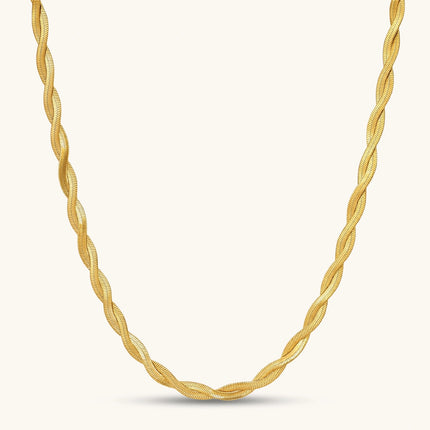 18K gold-plated twisted double herringbone snake chain necklace with lobster clasp and extender on white background.